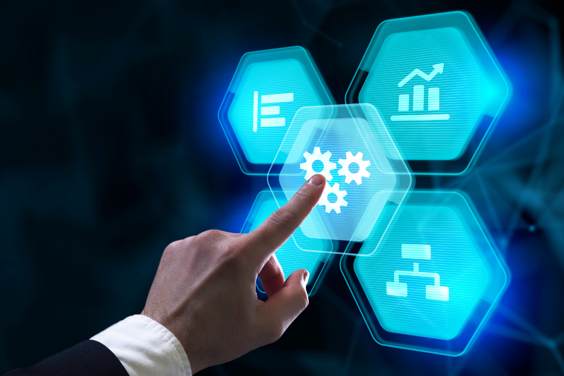 a hand pressing a button on a digital interface