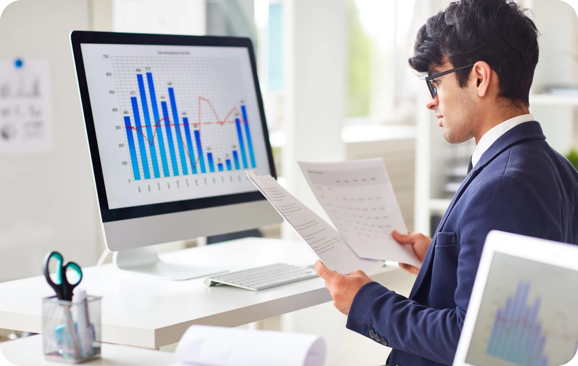 Business analyst reviewing performance data during an SAP audit